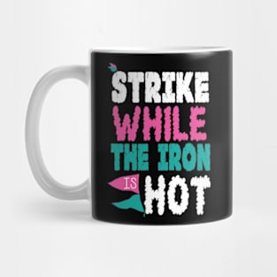 strike the iron hot Mug